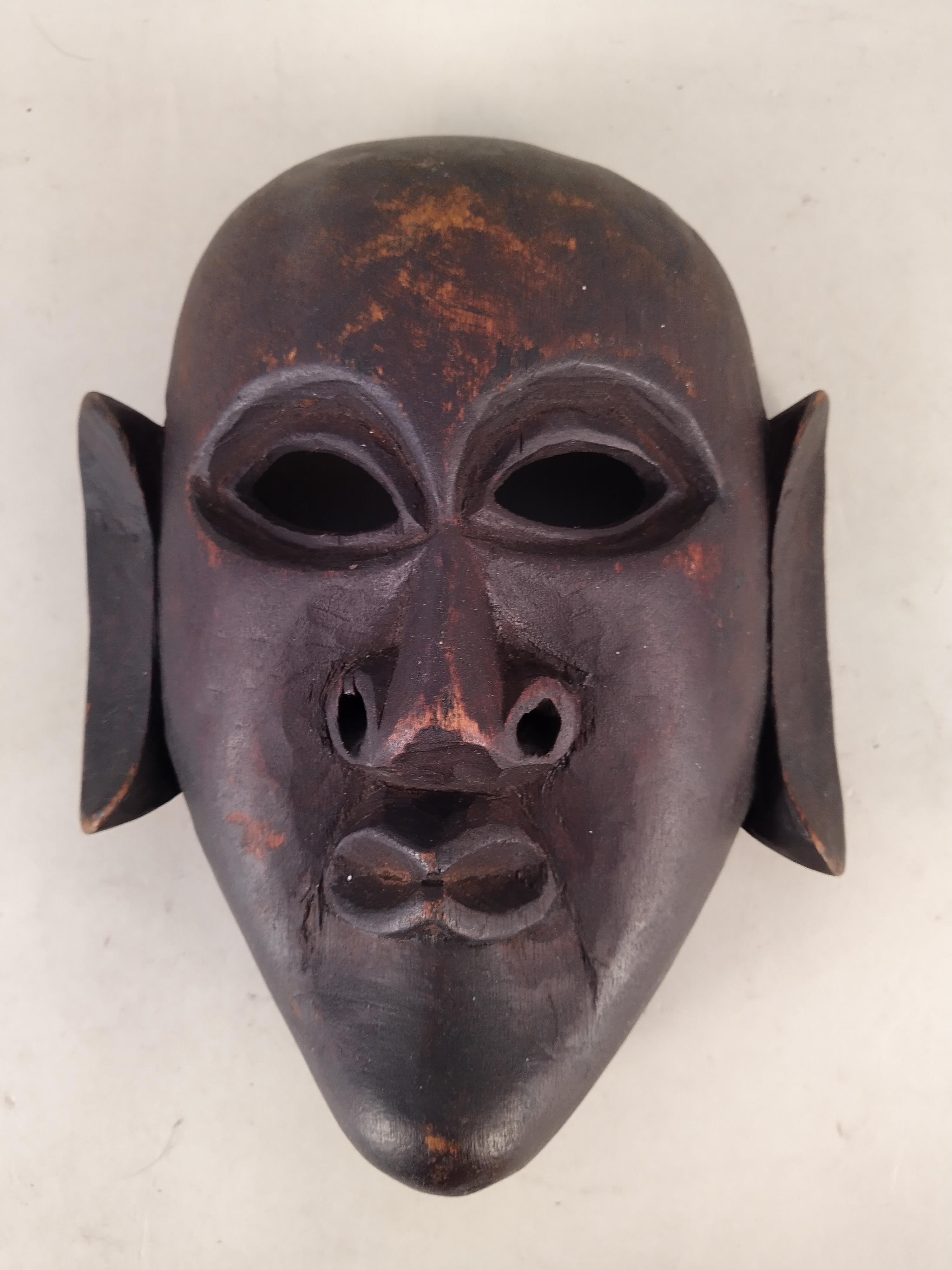 Two African carved wood face masks plus a carved coconut bowl on stand decorated with elephants - Image 3 of 3