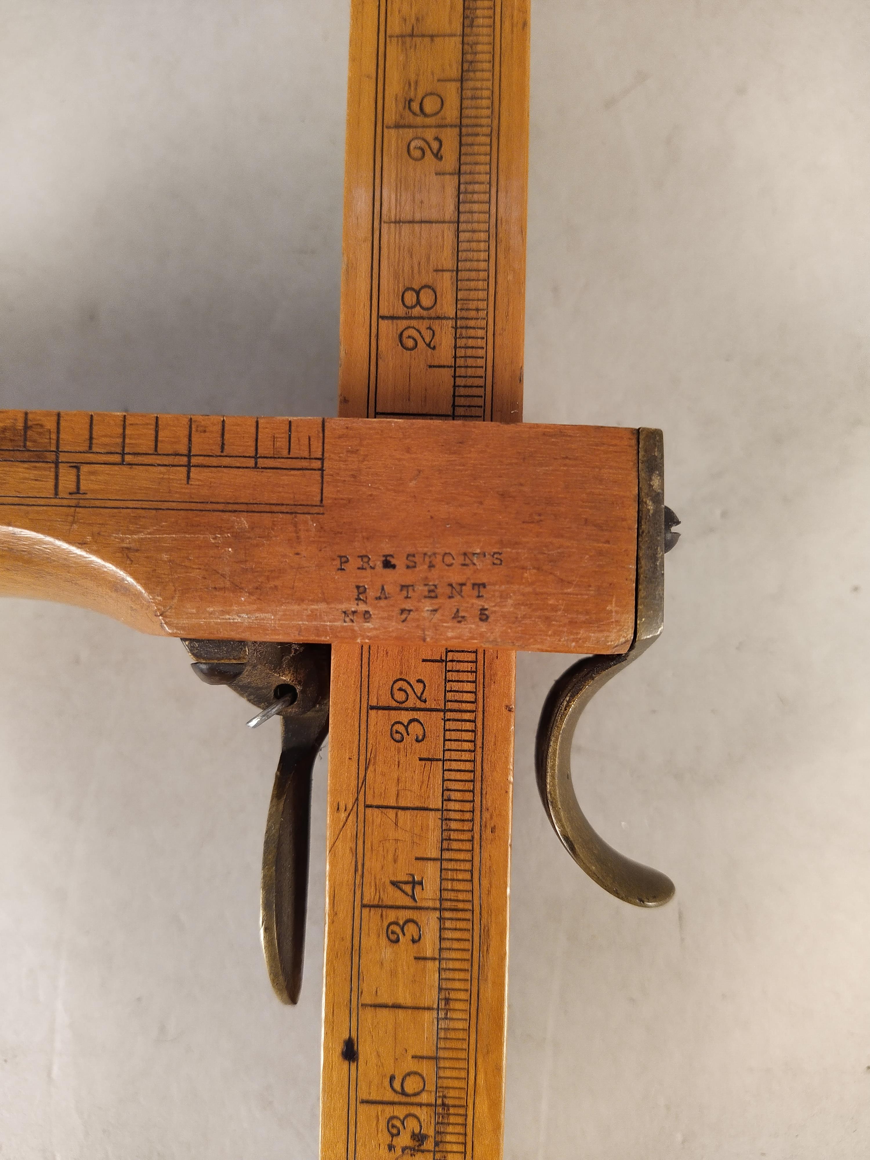 A vintage Prestons patent shoe size measuring instrument made from wood with various measuring - Image 3 of 3