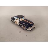 A Welsotoys tin plate gyro siren car,