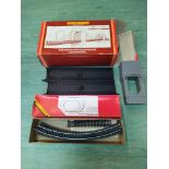 A large selection of boxed Hornby train cars and accessories including suspension bridge,