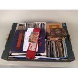 A large box of various vintage postcards with album plus tubs of mixed cigarette cards