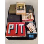 A good selection of vintage card packs including 'Pit', Happy Families - Vienna,