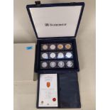 Cased Westminster twelve coin set 'A Lifetime of Service' £5 coins with certificates