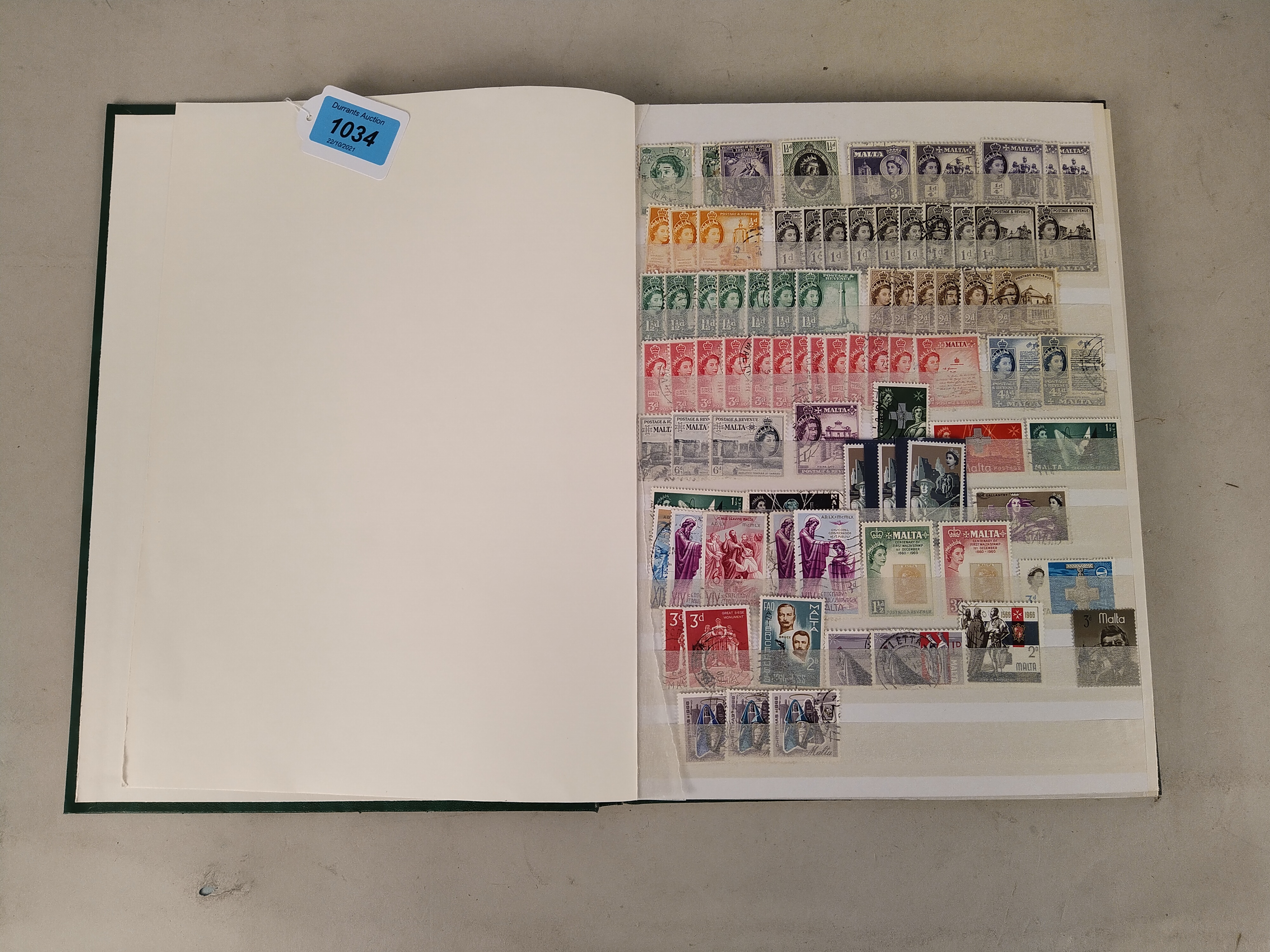 A stock book of stamps from Malta, Maldives,