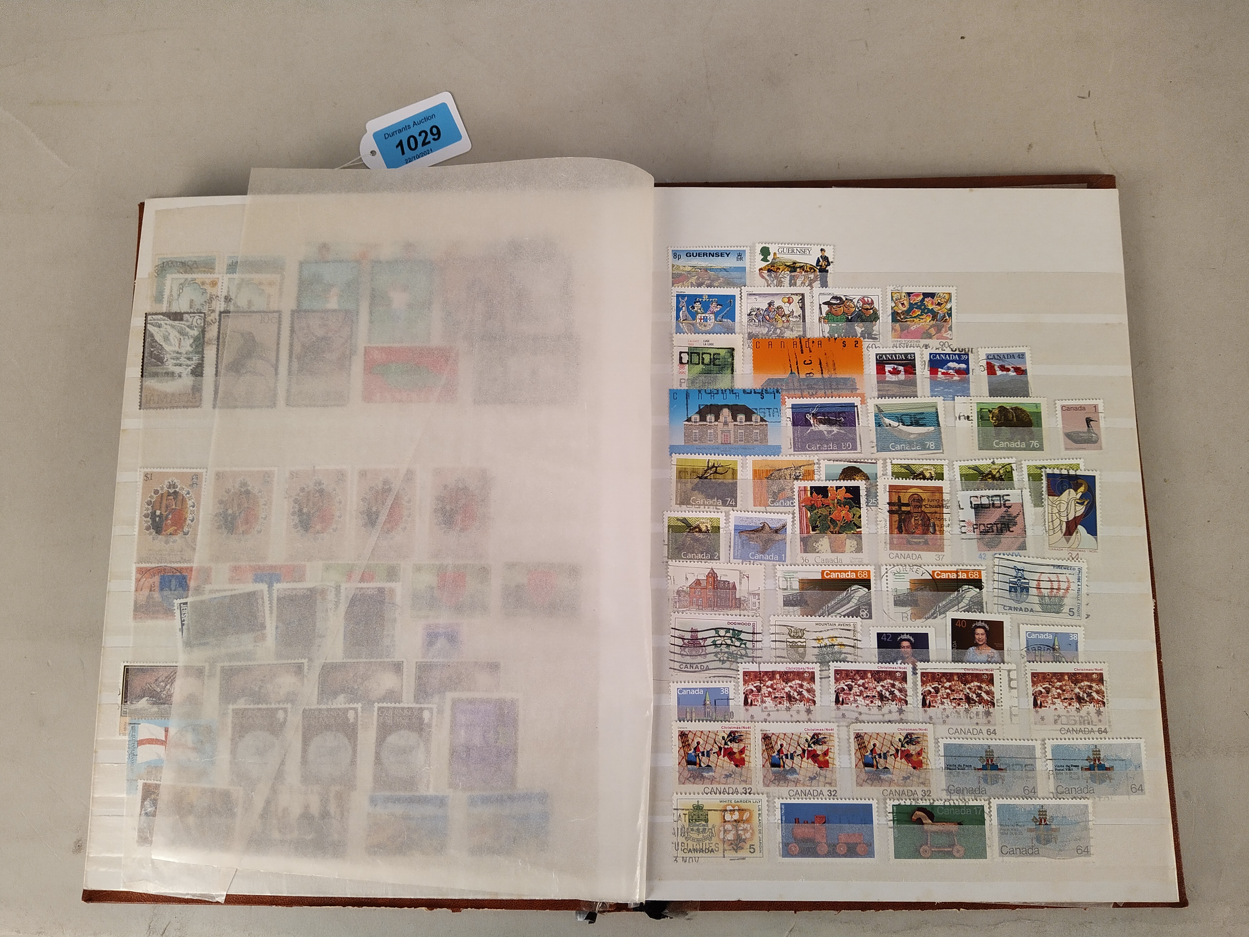 A stock book of commonwealth stamps, part filled including India, Guiana, - Image 3 of 3