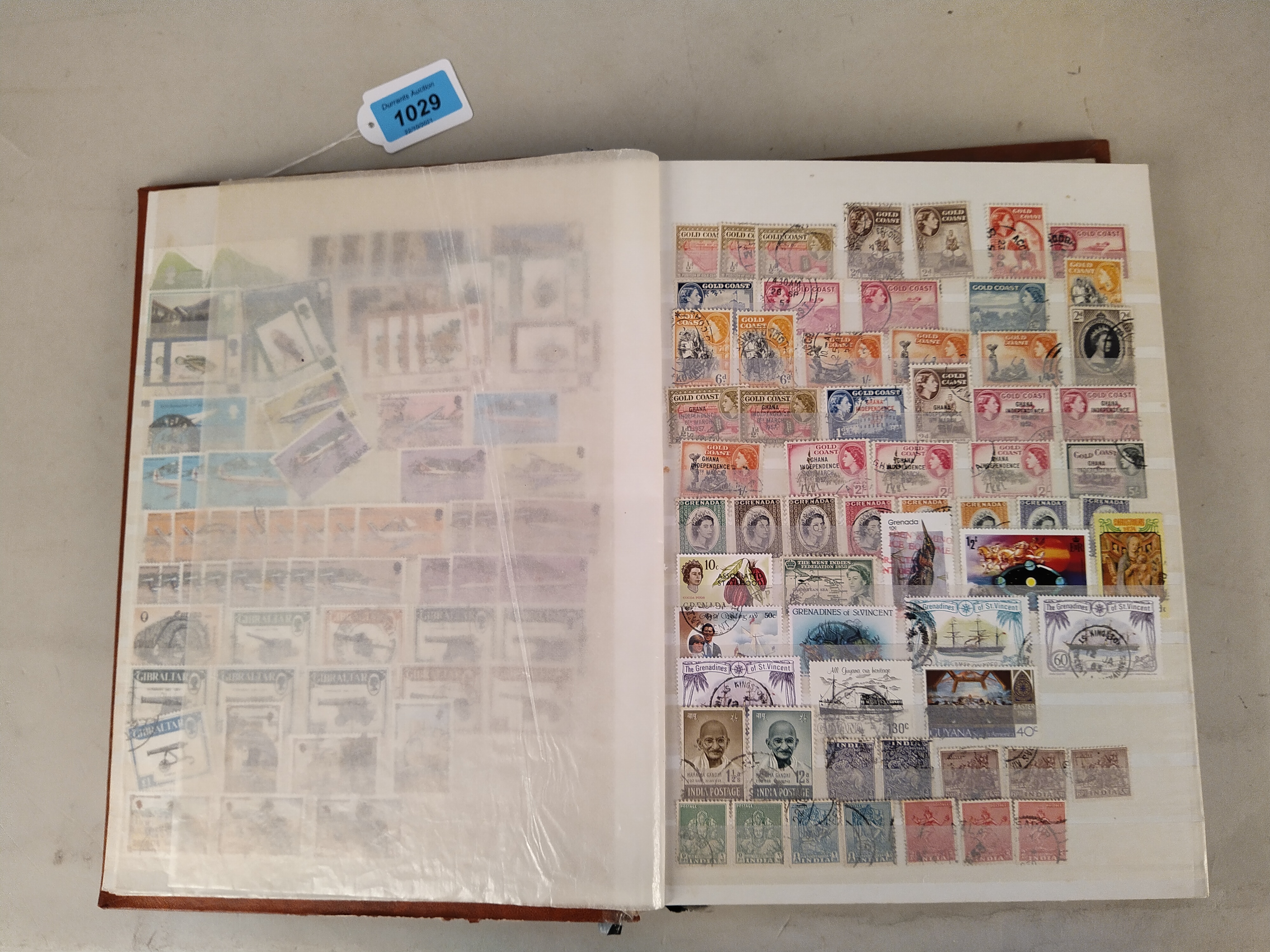 A stock book of commonwealth stamps, part filled including India, Guiana, - Image 2 of 3