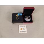 A boxed Royal Canadian mint 30 dollar commemorative coin,