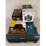 Three ERTL boxed model tractors plus three John Deere models