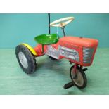 A vintage Triang pedal tractor with metal and plastic body (as found seat)