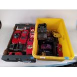 Two boxes of mainly Burago large model cars,