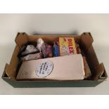 A large box of vintage board games including Scrabble, Ludo, Tiddlywinks,