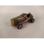 A hand built and painted wooden toy car,