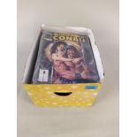 A box of vintage comics including Conan the Barbarian, X-Files,