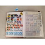 A stock book of commonwealth stamps, part filled including India, Guiana,
