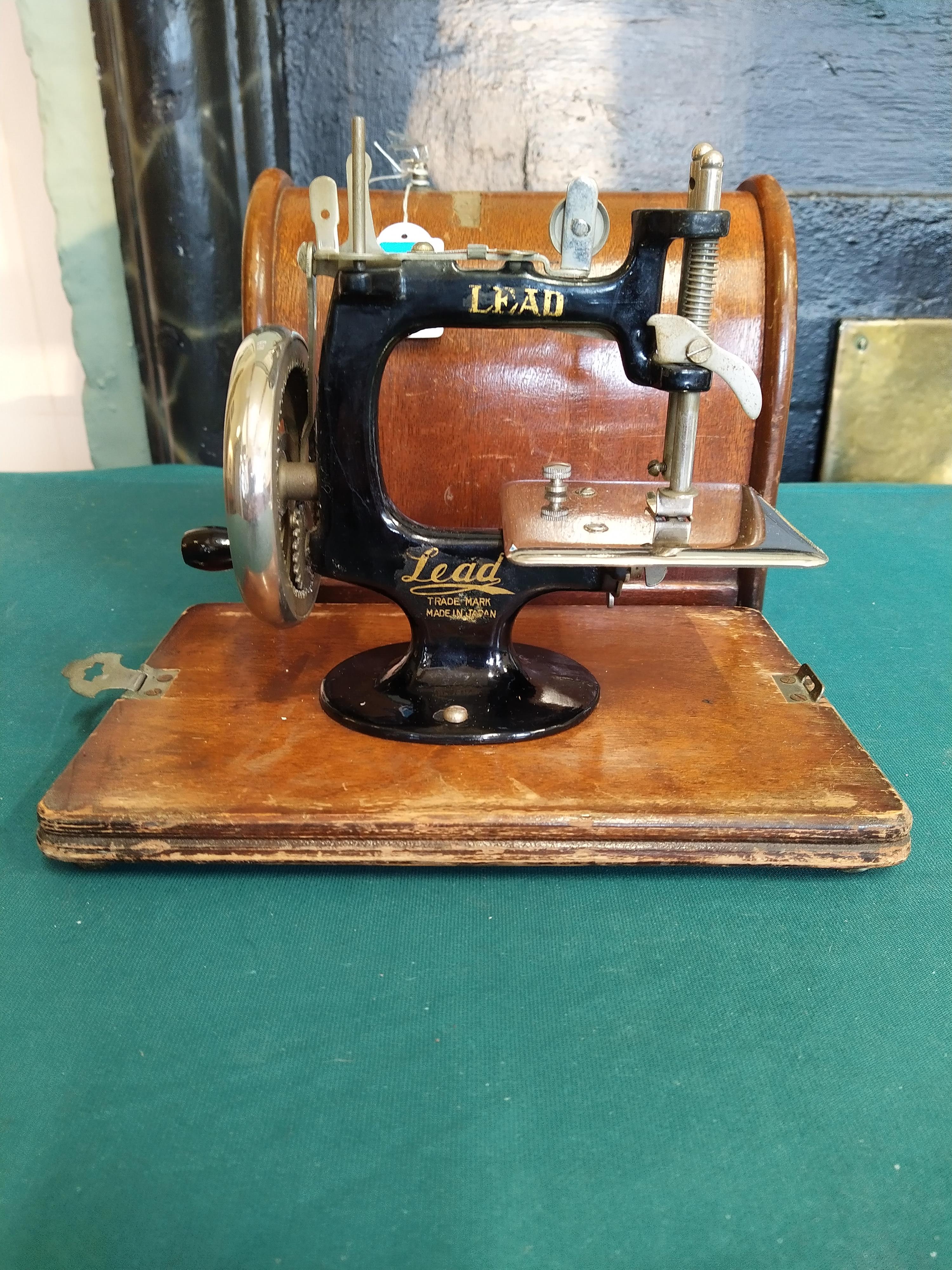 A vintage 'Lead' mini sewing machine in box - Image 2 of 3