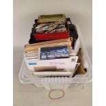 A tub of various stamp albums,