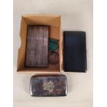 Three vintage cigarette cases plus a Woman's Own cookery medal,