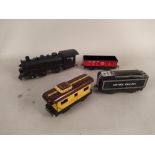 A selection of vintage Hornby tin plate signals together with a 1940's Marx Marlines battery