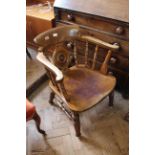 A beech and elm smokers bow chair with draught shaped back splat