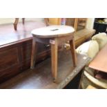 A 19th Century elm low stool and an oak milking stool