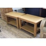 A pair of 20th Century oak two tier coffee tables