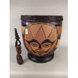 A large Zambian drum with carved and painted wooden body with stretched hide skin,