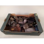 A box of mixed wood and metal ware including brass candle sconces,