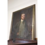 A large oil portrait of a gentleman, bears name 'Ernest Moore 1911',