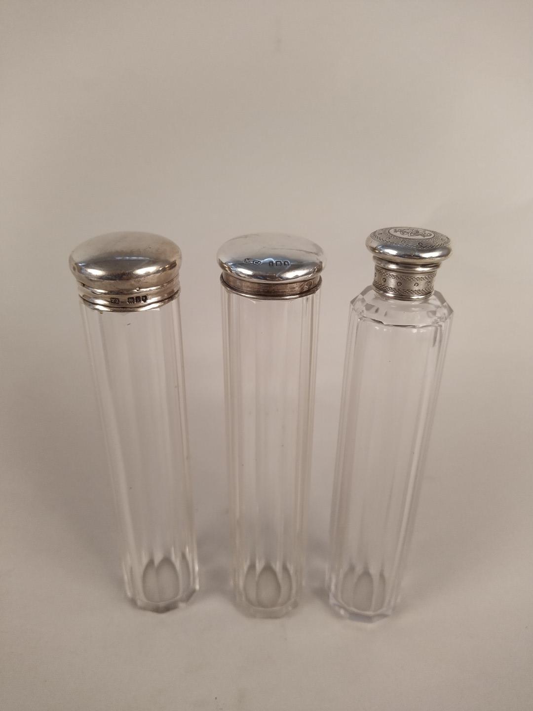 Six silver topped cut glass bottles from a fitted toilet box - Image 3 of 3