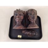 A pair of vintage African carved head bookends plus a small mask