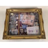 A table top display cabinet and contents including coins, costume jewellery, watches etc,