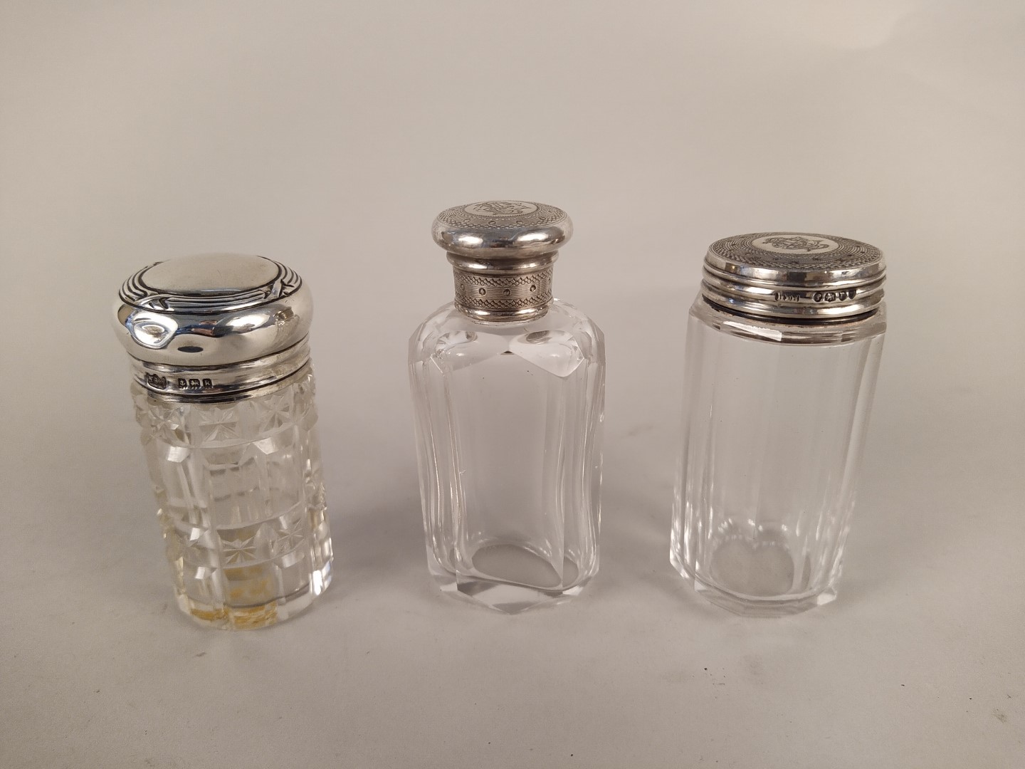 Six silver topped cut glass bottles from a fitted toilet box - Image 2 of 3