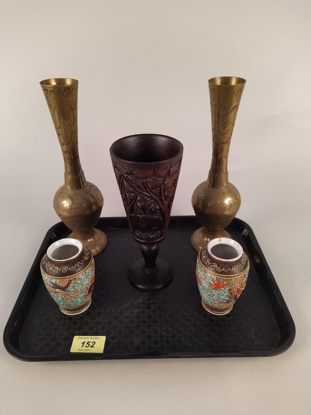 A pair of Indian brass vases,