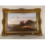 A 19th Century oil on canvas of a rural scene with figures in the foreground in a swept gilt frame,