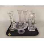 A pair of cut glass decanters, candlesticks,