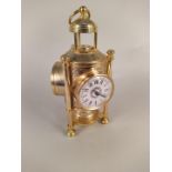 A 20th Century gilded brass table multi faced clock,