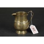 A silver milk jug, hallmarked Birmingham 1922, makers mark Adie Brothers Ltd,