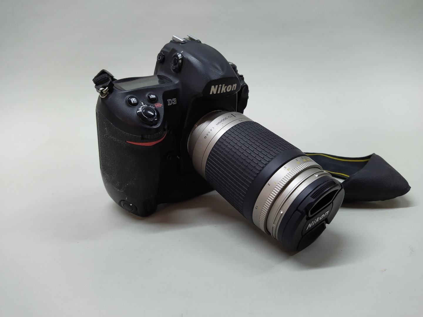 A Nikon D3 camera body with a Nikon 70-300mm lens and charger (as found) in original box - Image 2 of 3