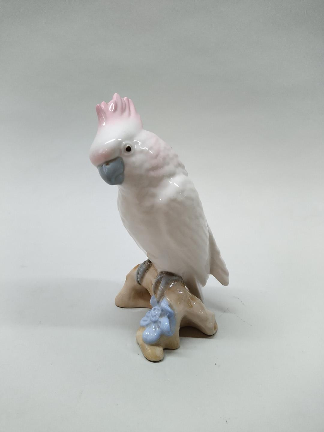 An early 19th Century Royal Dux, pink pad mark cockatoo,