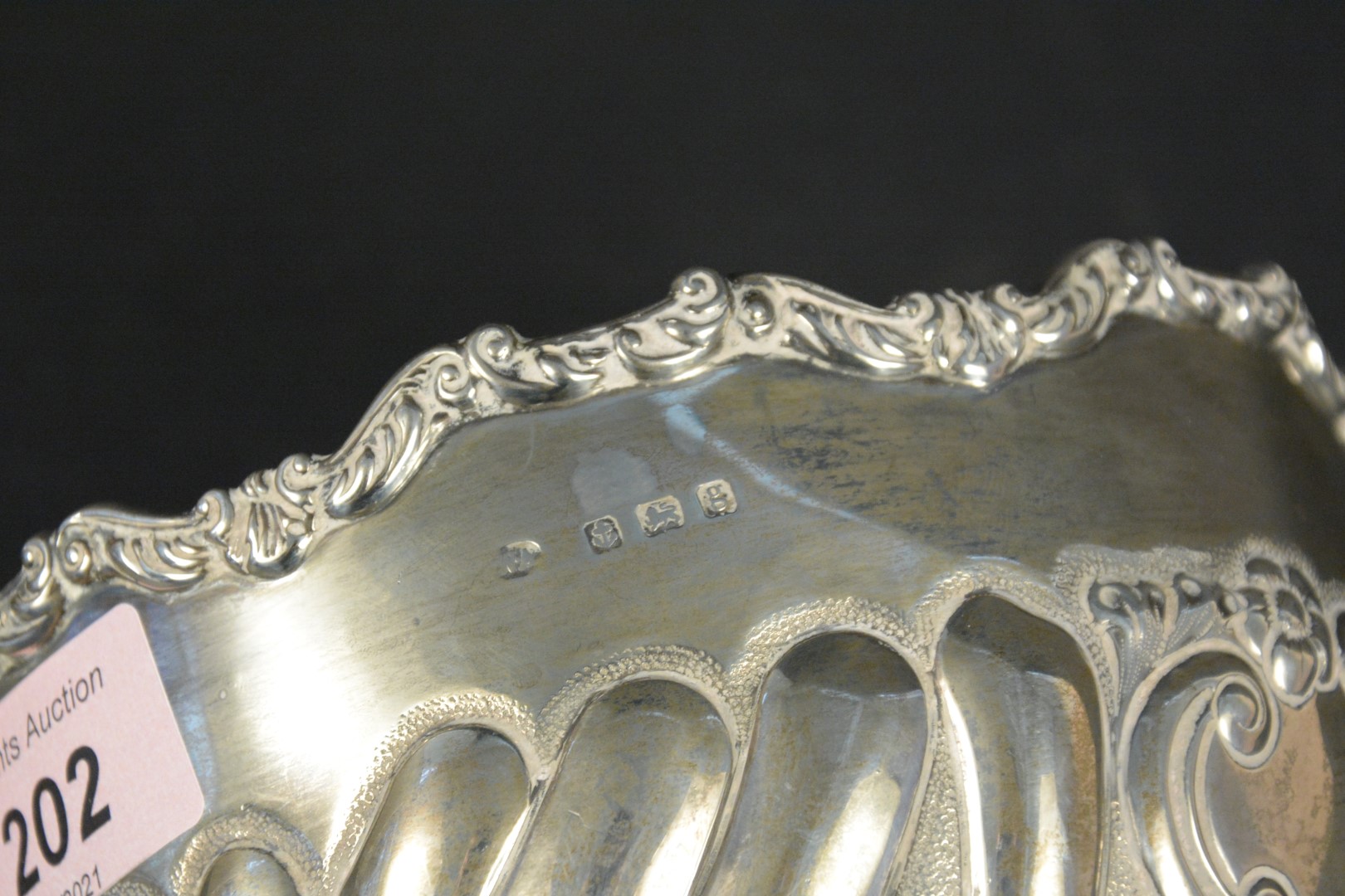 A silver bowl on pedestal base with applied and embossed floral decoration, - Image 3 of 3