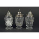 A set of three Georgian silver and cut glass condiments comprising of mustard,