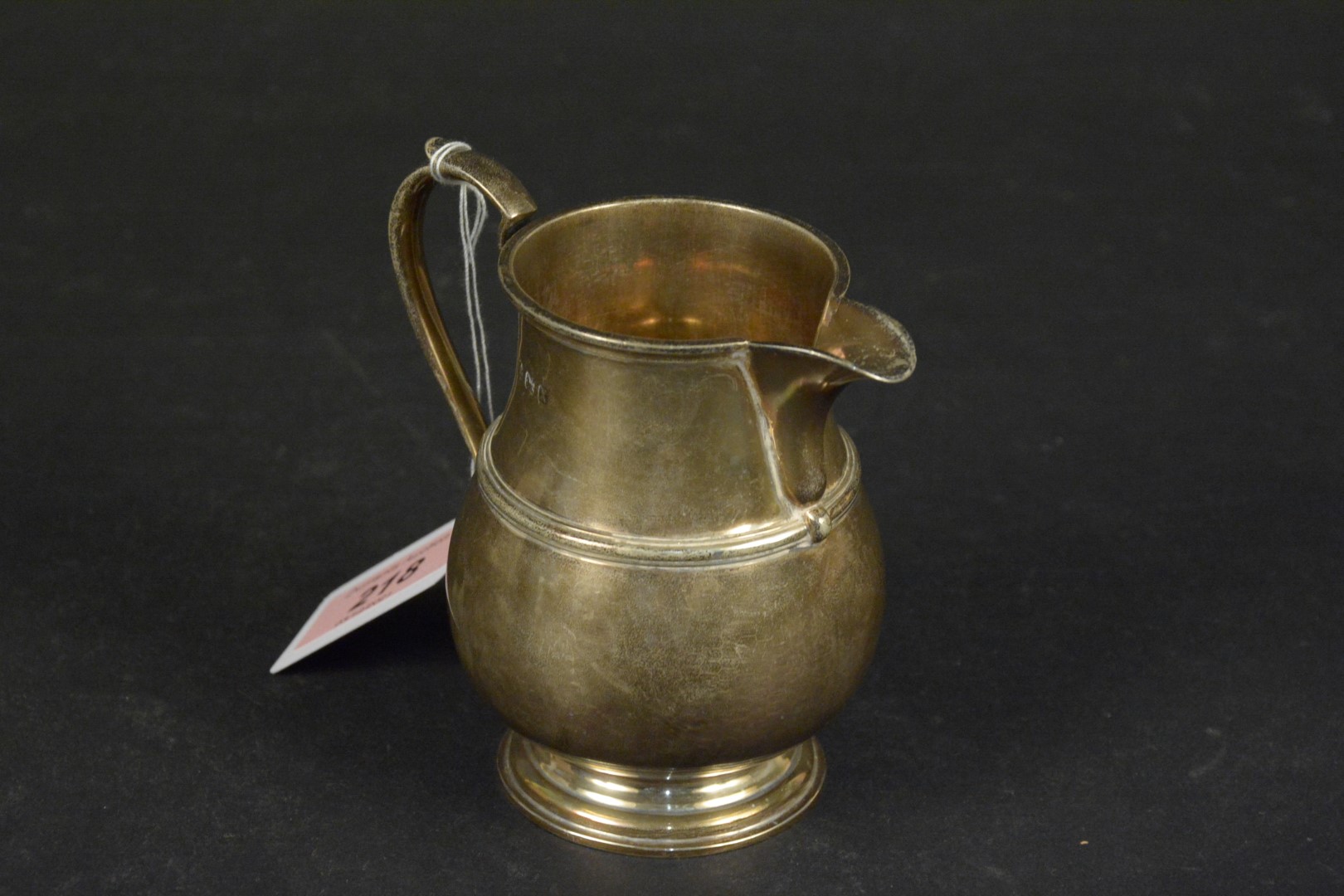 A silver milk jug, hallmarked Birmingham 1922, makers mark Adie Brothers Ltd, - Image 2 of 3