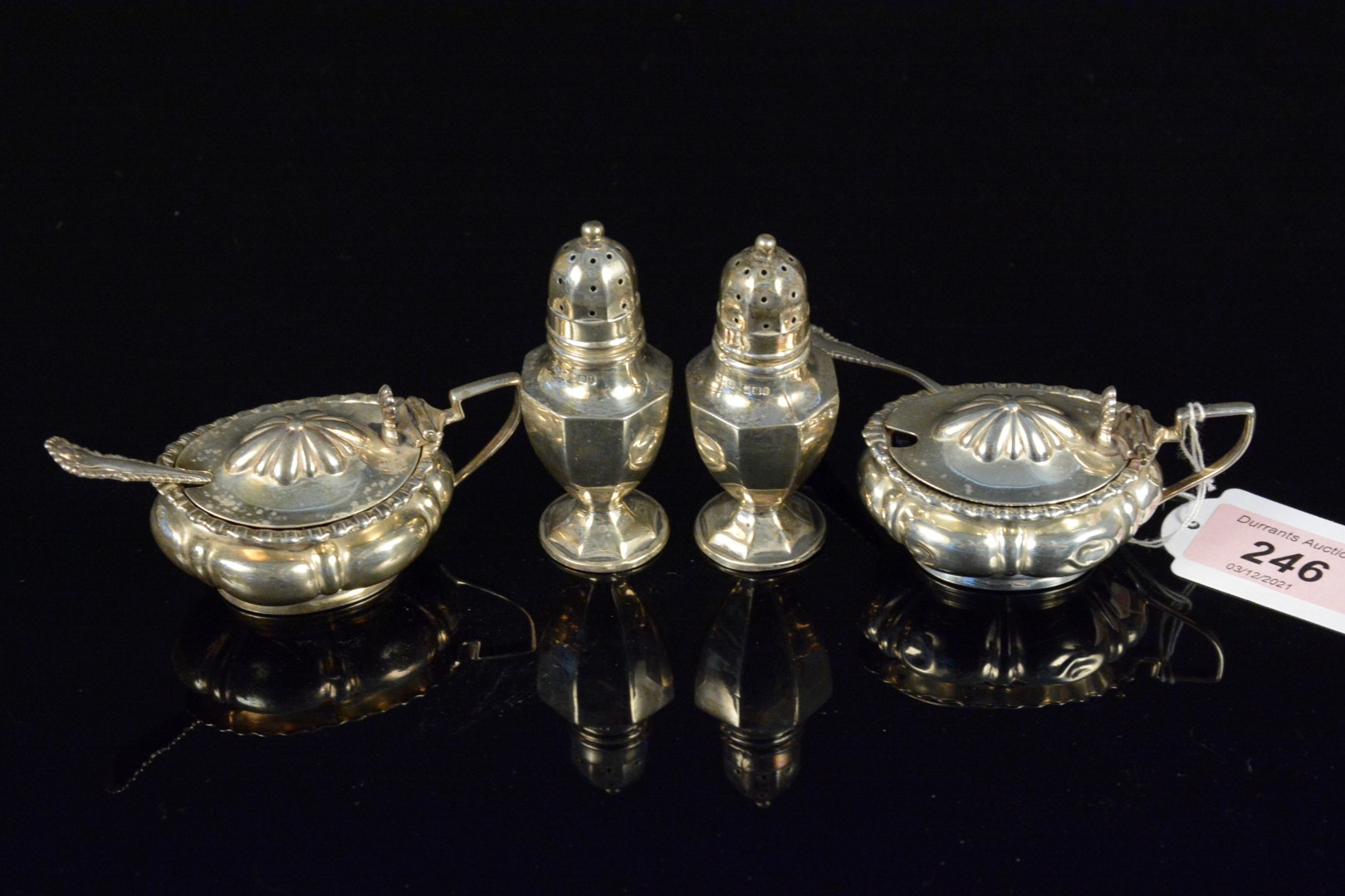 Mixed cruet items consisting of two silver mustards and two silver pepperettes (as found),