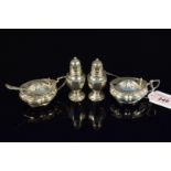 Mixed cruet items consisting of two silver mustards and two silver pepperettes (as found),