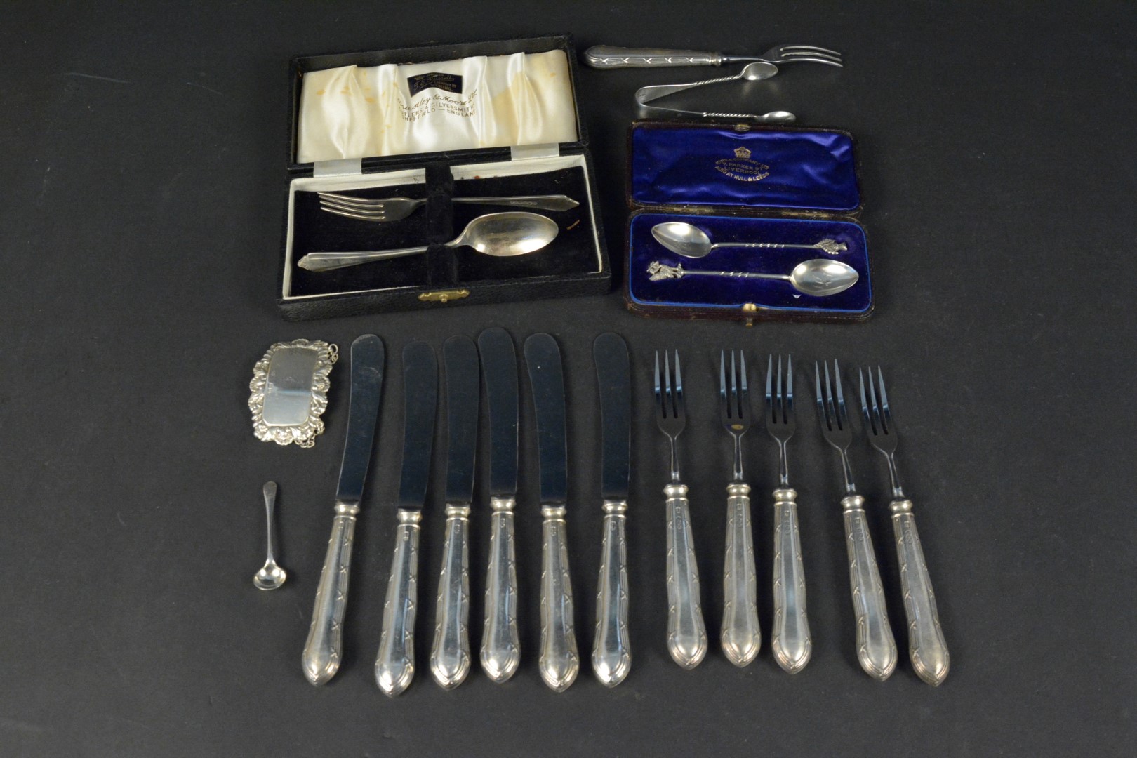 A mixed silver lot including label,