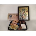 A selection of religious based items including a plaster Madonna and Child, carved wooden items,