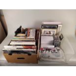 A box of Marilyn Monroe books plus a tub of Marilyn videos,