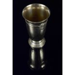 A continental silver vase with simple shell shaped decoration, stepped circular base,