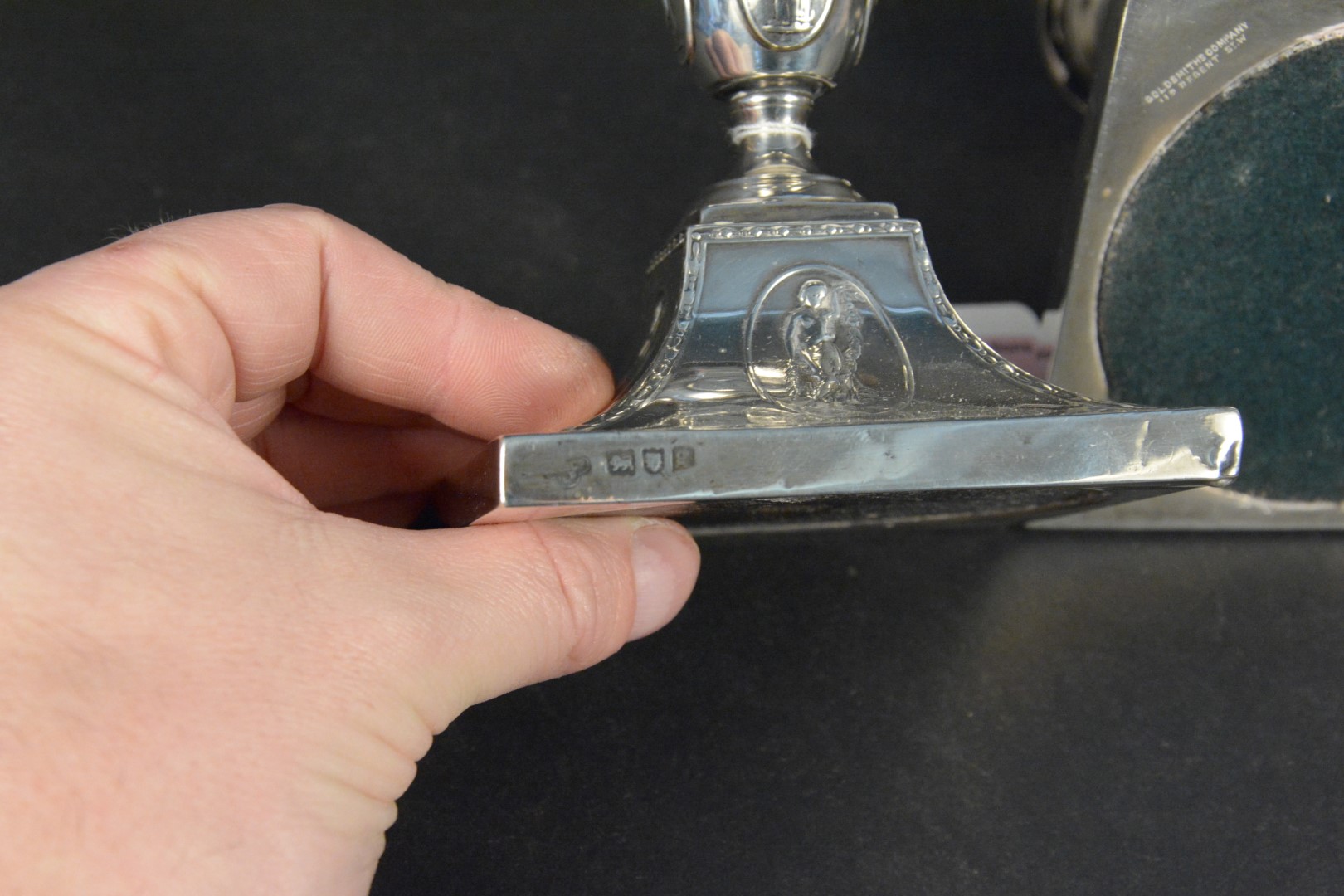 A pair of Adams style silver candlesticks with embossed images of Greek women and floral swag - Image 3 of 3