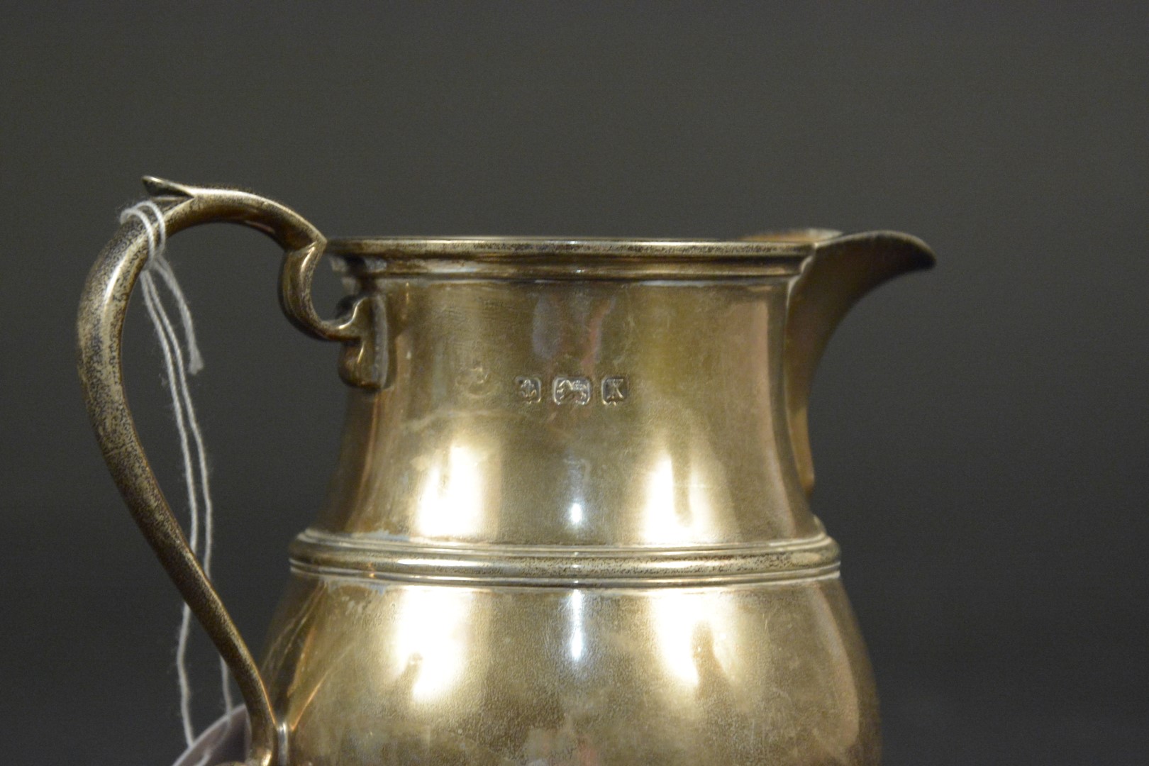 A silver milk jug, hallmarked Birmingham 1922, makers mark Adie Brothers Ltd, - Image 3 of 3